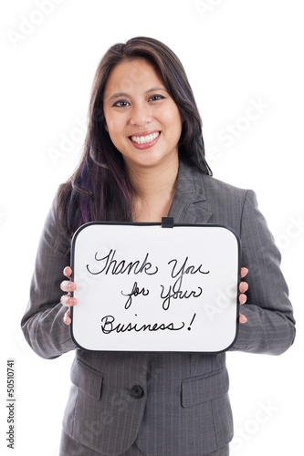 Photo: Asian businesswoman with thank you sign Asian businesswoman with thank you sign