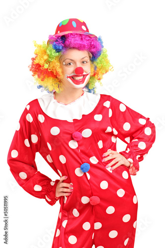 Photo: Smiling female clown in a red costume posing Smiling female clown in a red costume posing