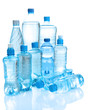 Different water bottles isolated on white