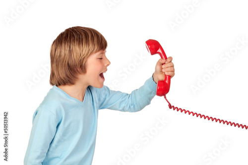 Photo: Angry child shouting At Phone Angry child shouting At Phone