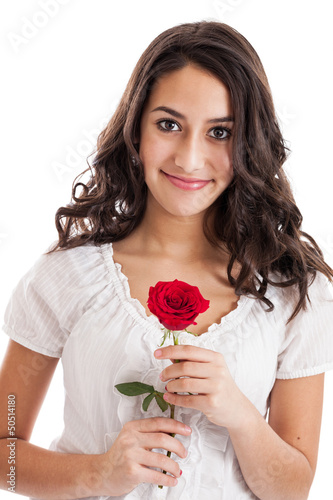 Photo: Cute tween girl holding a red rose portrait Cute tween girl holding a red rose portrait