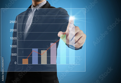 Photo: hand pushing write graph hand pushing write graph