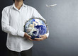  earth globe in his hands