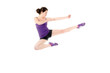 Athletic woman performing a flying side kick