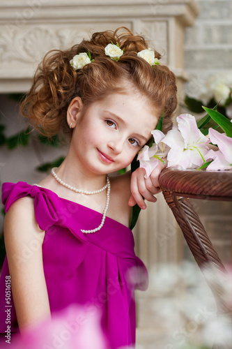 Photo: Portrait of a beautiful girl with flowers Portrait of a beautiful girl with flowers