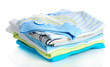 Pile of baby clothes isolated on white