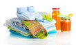 Pile of baby clothes isolated on white