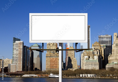 Photo: Billboard Sign Against New York City Background Billboard Sign Against New York City Background