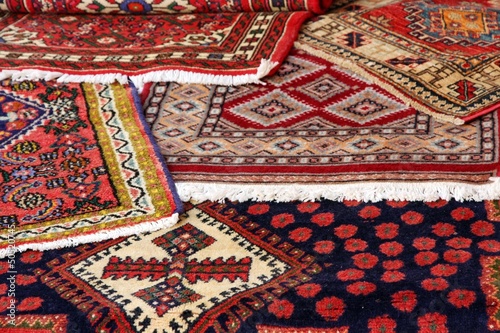 Photo: textures and background of ancient handmade carpets and rugs textures and background of ancient handmade carpets and rugs