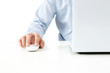 Close up of young man working on a laptop isolated on white