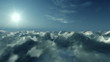 Flight above clouds at sunset