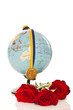 gold medal with a globe and flowers