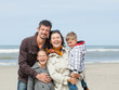 Photo: Family on the beach in summer Family on the beach in summer