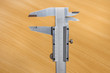 vernier calipers on cinnamon background