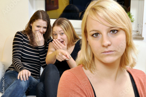Photo: Junge Frau als Mobbing-Opfer Junge Frau als Mobbing-Opfer