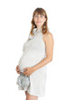 A pregnant woman, 9 months, holding her tummy
