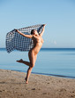 Foto: naked woman on a beach naked woman on a beach