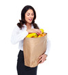 Foto: Young woman with a grocery bag. Young woman with a grocery bag.