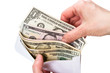 Photo: Cash dollars in the envelope Cash dollars in the envelope
