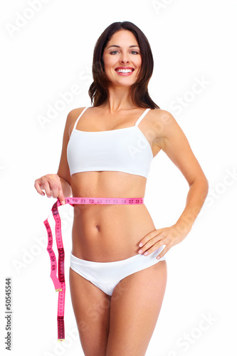Photo: Beautiful healthy woman with a measuring tape. Beautiful healthy woman with a measuring tape.