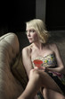 Blonde Woman Drinking a Pink Martini