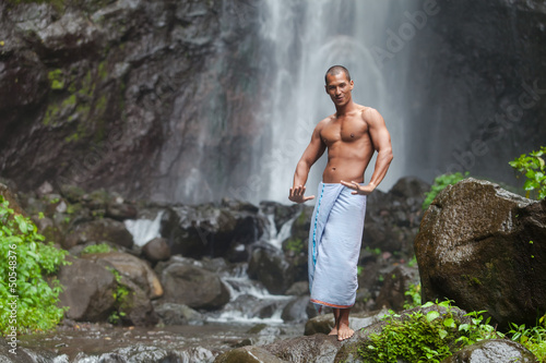 Photo: Handsome man at waterfall Handsome man at waterfall