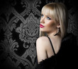 Portrait of beautiful woman in luxury fur coat