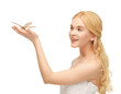 woman with butterfly in hand