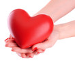 Red heart in woman hands, isolated on white