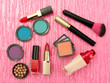Decorative cosmetics on pink background