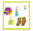 Colorful frame with different things on rope isolated on white