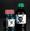 Deadly poison in bottles on black background