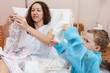Son visiting mother in hospital