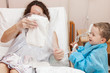 Son visiting mother in hospital