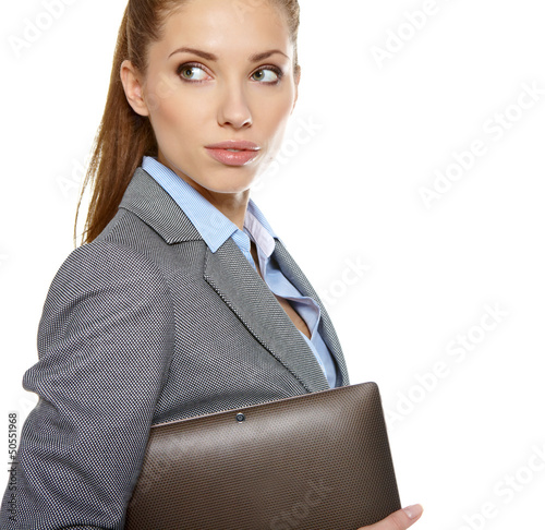 Photo: young attractive business woman uses a mobile tablet computer wi young attractive business woman uses a mobile tablet computer wi