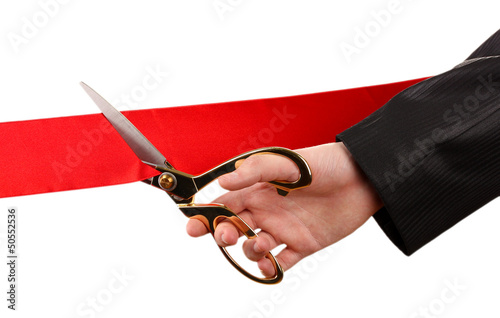 Photo: Cutting red ribbon, isolated on white Cutting red ribbon, isolated on white