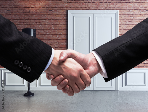 Photo: handshake and room handshake and room