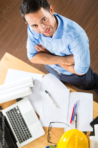 Photo: Architect working at home Architect working at home