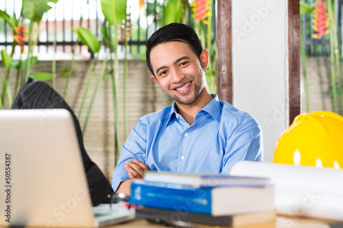 Photo: Architect working at home Architect working at home