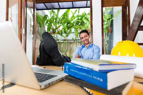 Photo: Architect working at home Architect working at home