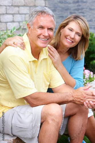 Photo: Gardening couple. Gardening couple.