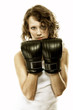 Fit woman boxing - isolated over  white
