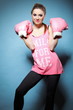 Female boxer model with big fun pink gloves