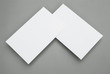 blank business cards on grey background