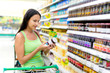 A woman buys jam