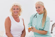 Home nurse and patient posing