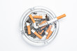 Overhead of burning cigarette in ashtray