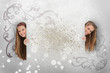 Pretty girls peeking out from behind copy space