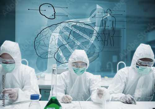 Photo: Chemists working in protective suit with futuristic interface sh Chemists working in protective suit with futuristic interface sh