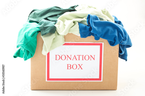 Photo: Cardboard donation box with clothes Cardboard donation box with clothes